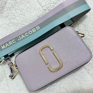In excellent condition, rarely used MJ snapshot camera bag in dusty lilac